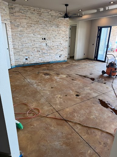 Before — Bare slab, glue residue and staining